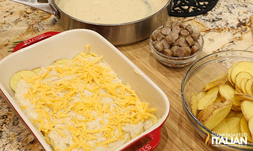 adding cheese to casserole dish