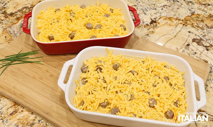 cheesy sausage scalloped potatoes in casserole dish