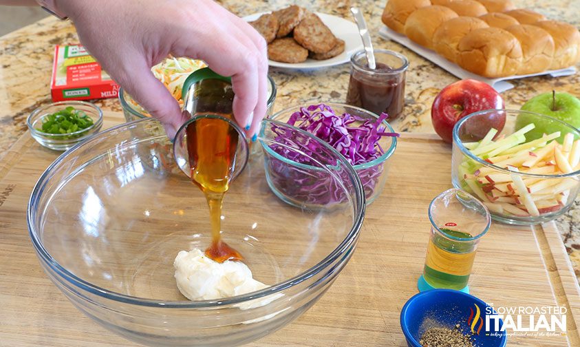 adding honey to sausage summer sliders