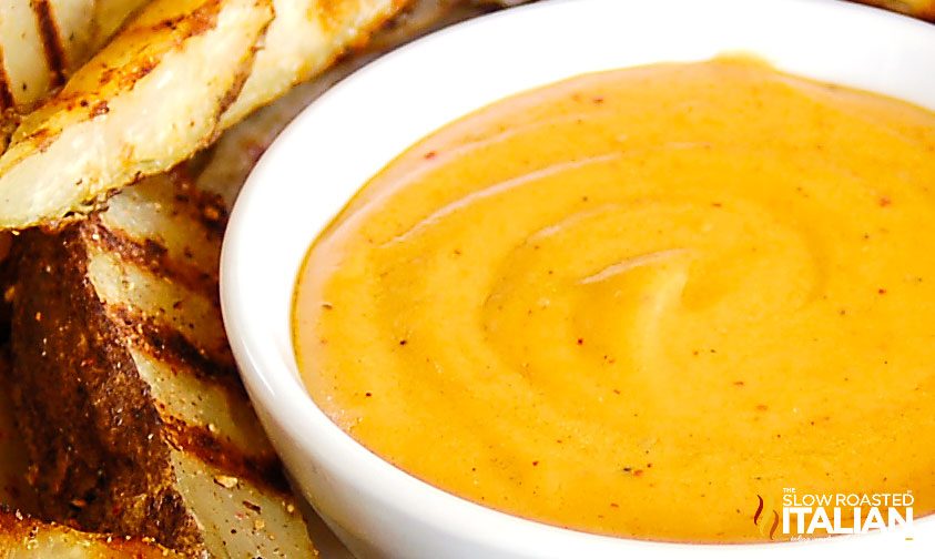 beer cheddar cheese sauce with potato wedges