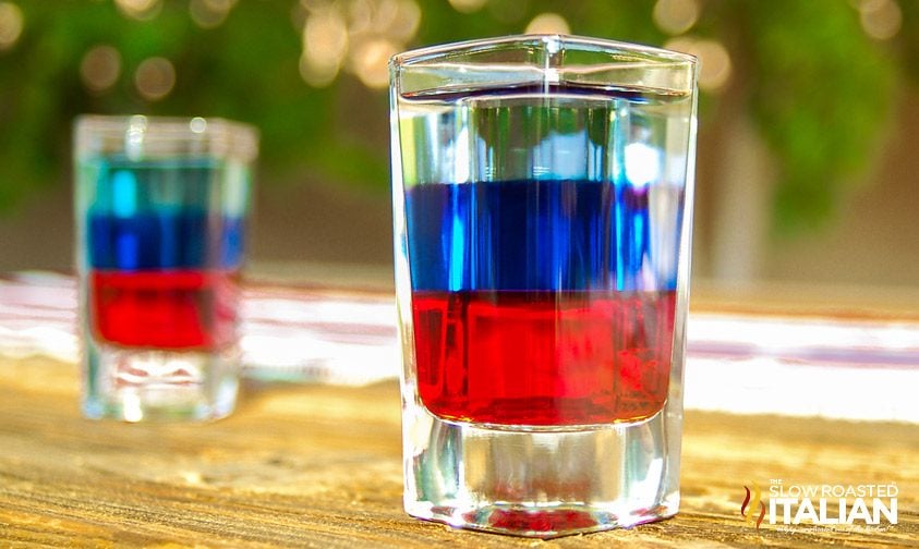 red white and blue shots on table