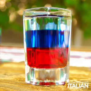 red white and blue layered shot in glass