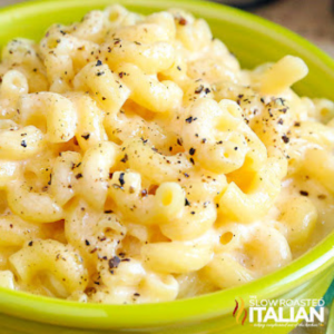 creamy mac and cheese in green bowl