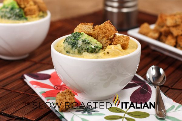 broccoli chese soup with chicken and rice in a bowl on the table