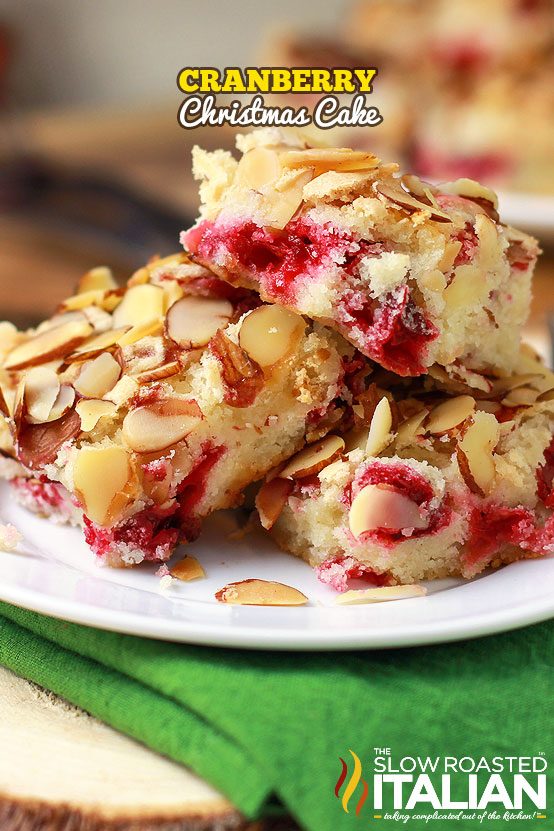cranberry Christmas cake cut into squares on a plate