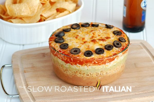 7 layer Mexican bean dip in glass bowl