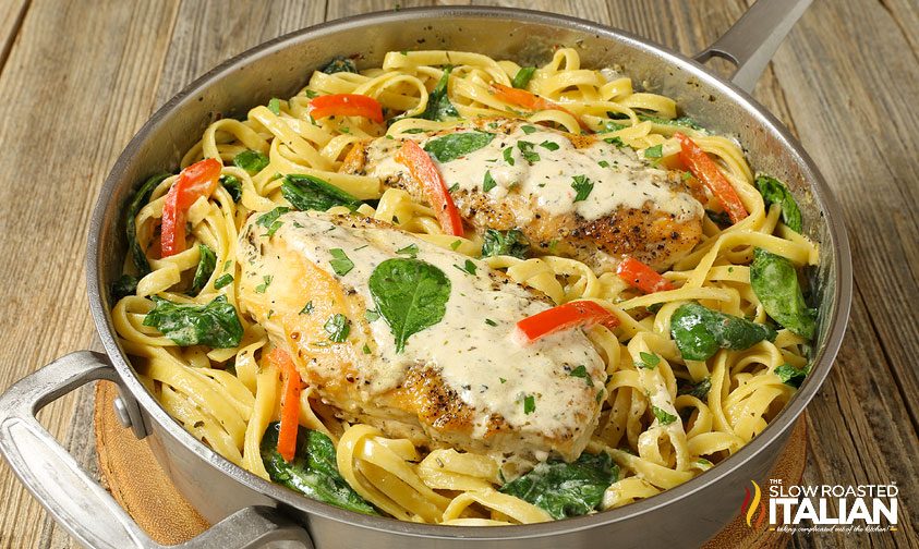 tuscan garlic chicken and linguine in a pan