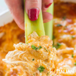 celery dipped in buffalo chicken dip