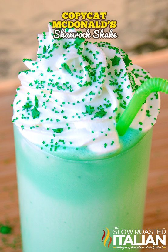 copycat McDonald's shamrock shake in glass with whipped cream and sprinkles
