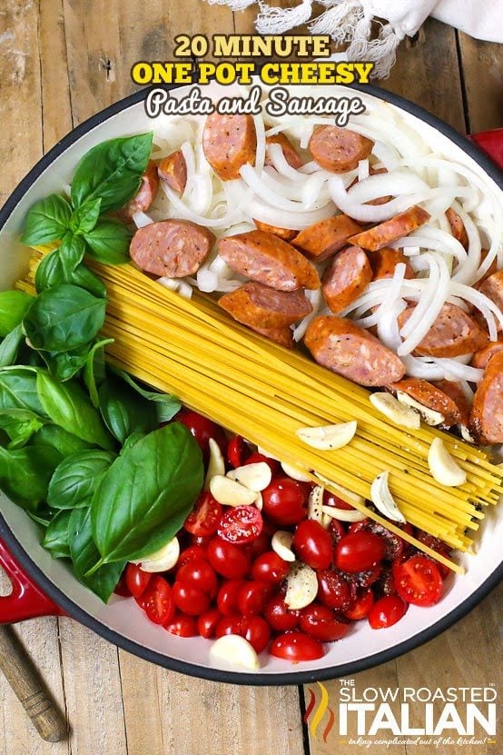 titled (shown in a pot) cheesy pasta and sausage dinner