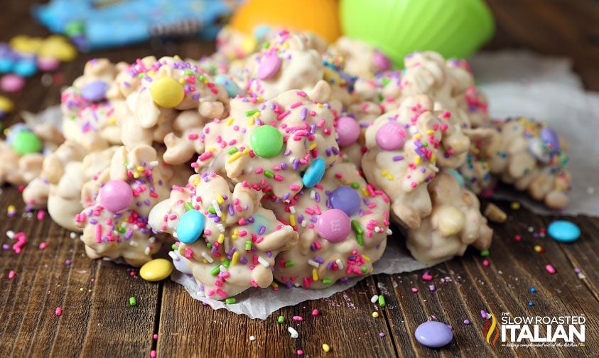 Easter crockpot candy stacked on wood board