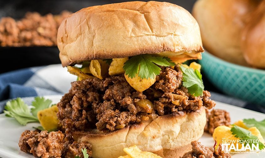 sloppy joe sandwich topped with corn chips