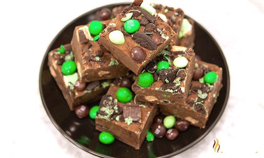 cut mint chocolate fudge on plate