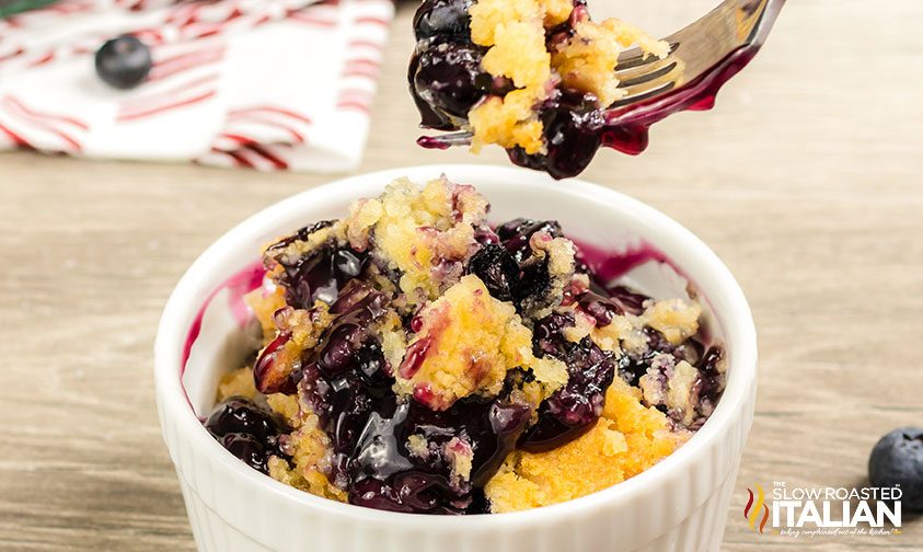 bite of blueberry dump cake on fork