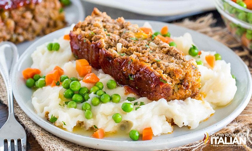 cracker barrel meatloaf on plate with mashed potatoes and veggies