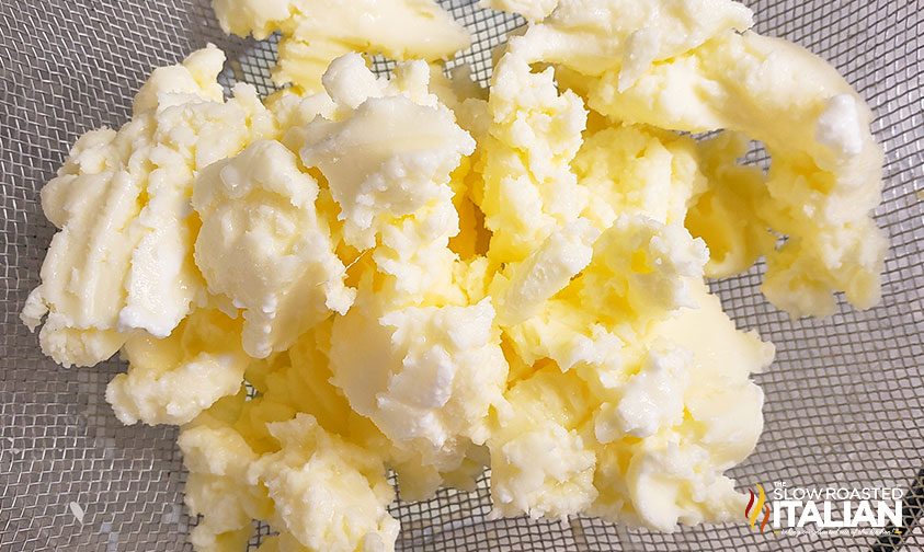 homemade butter in strainer