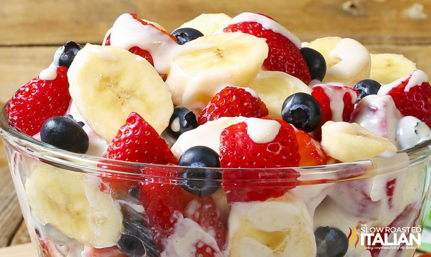 red white and blue cheesecake salad in large bowl