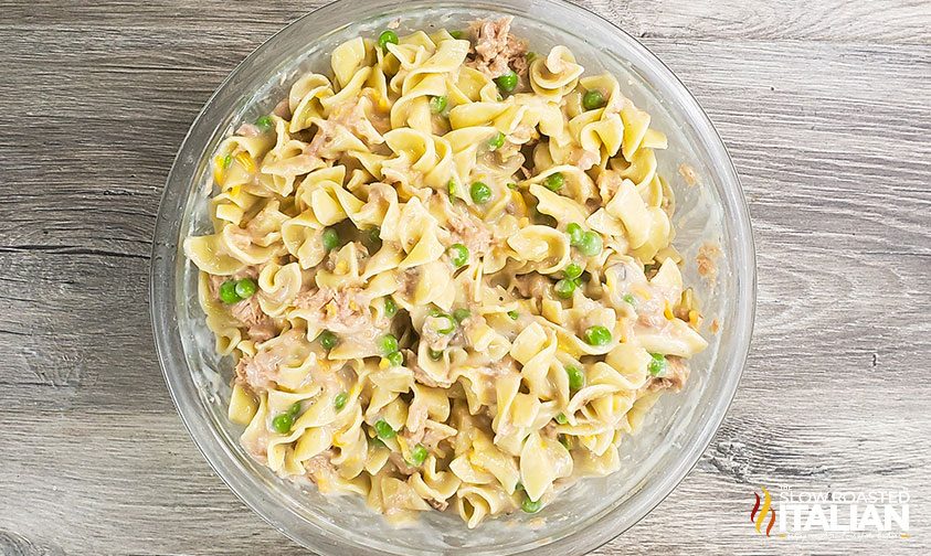 overhead: cheesy tuna noodle casserole ingredients in mixing bowl