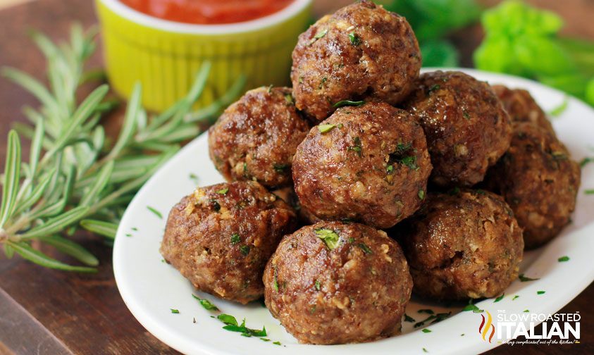 italian herb oven baked meatballs on platter