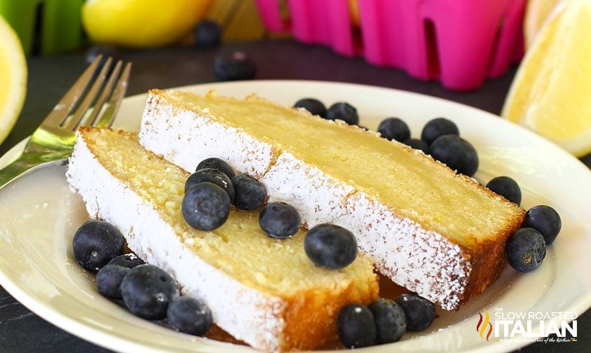 slices of lemon loaf cake topped with fresh blueberries