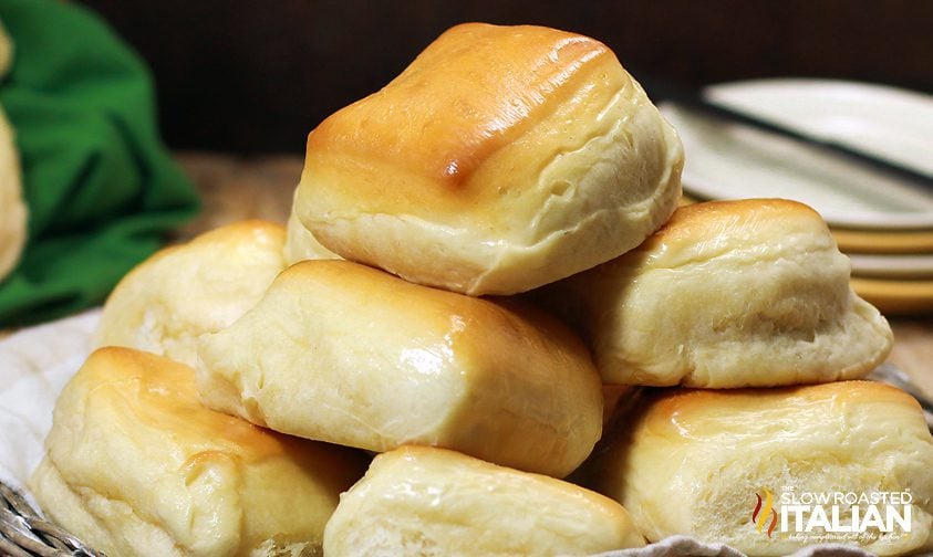 copycat texas roadhouse rolls stacked on plate