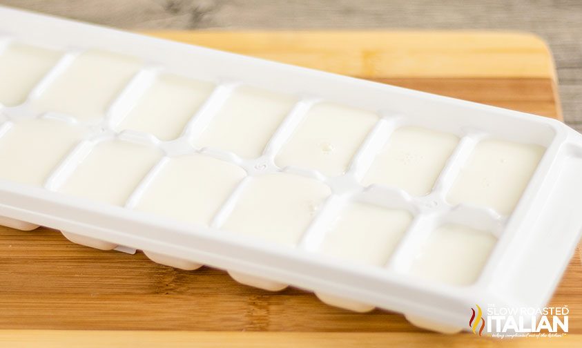frozen milk in an ice cube tray