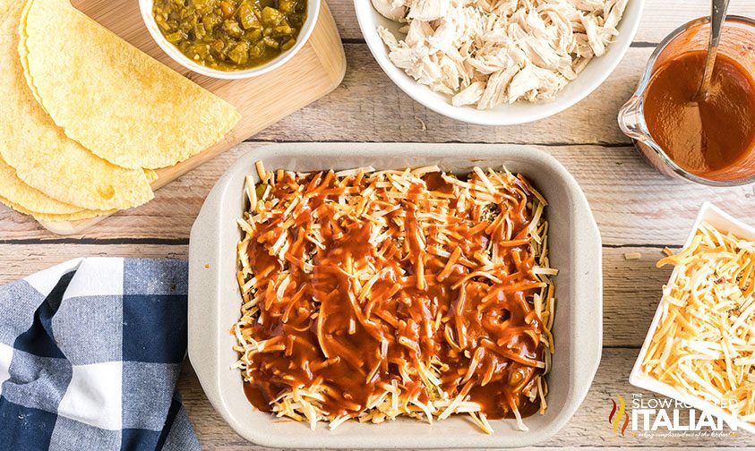 enchilada sauce and shredded Mexican cheese blend in casserole dish