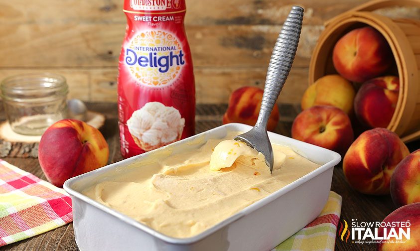 no churn peaches and cream ice cream with scoop