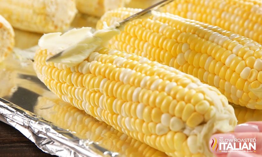 buttering corn on the cob