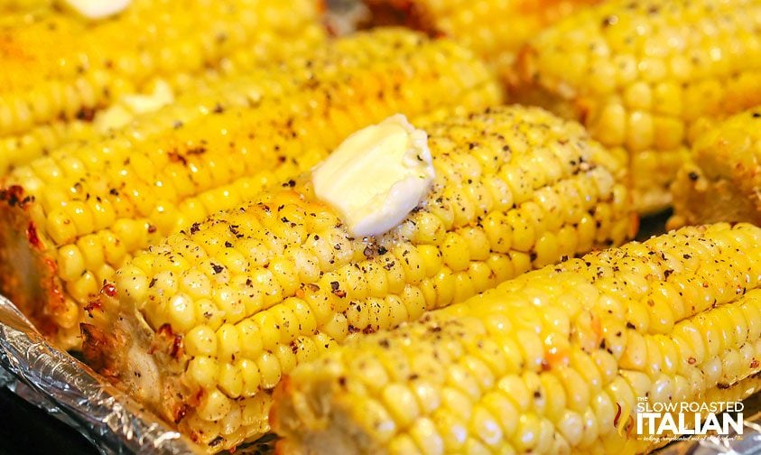 oven roasted corn topped with butter
