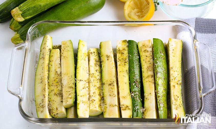 spears of zucchini seasoned with Parmesan for grilling