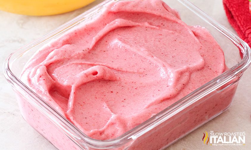 creamy strawberry banana ice cream in freezer-safe glass dish