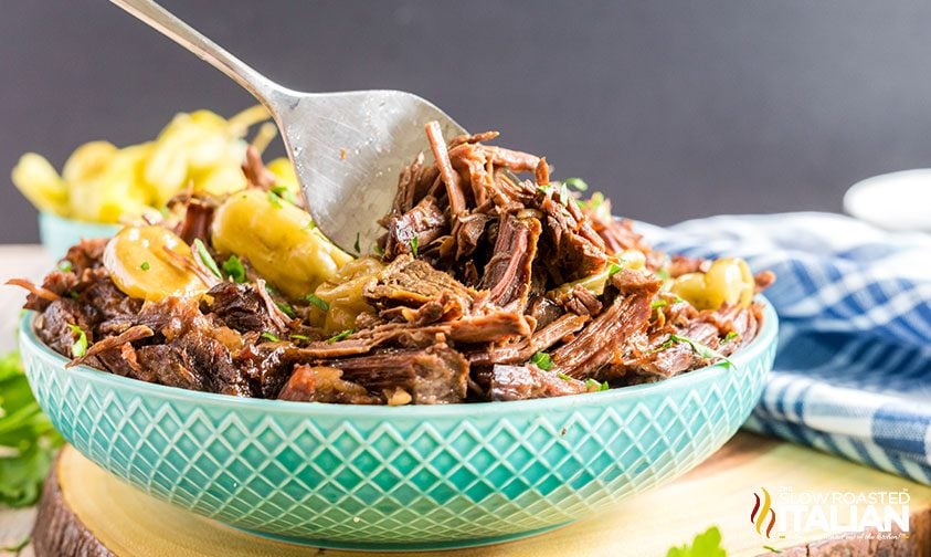 mississippi pot roast in blue serving bowl