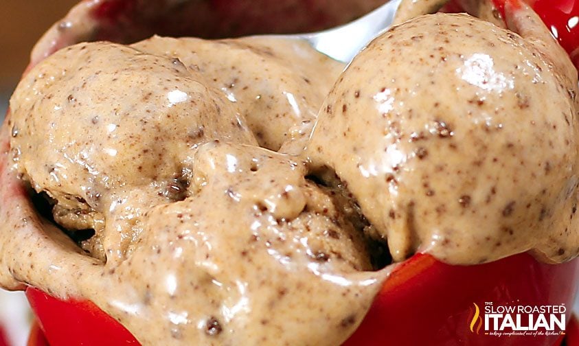 peanut butter and chocolate ice cream melting in a red mug