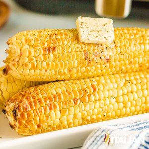 ears of air fryer corn on the cob with butter