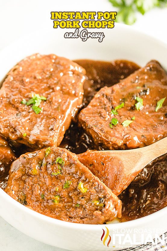 instant pot pork chops and gravy in a white serving dish.