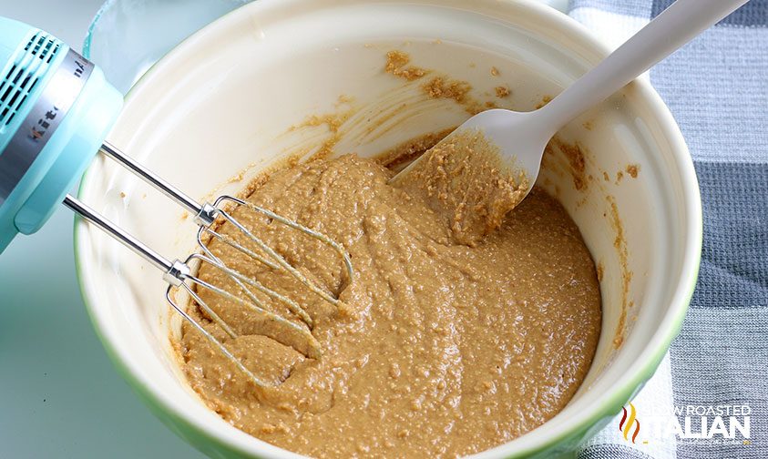 no bake peanut butter bars mixing the base in a bowl