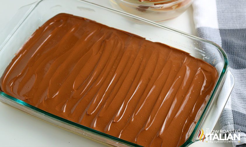 chocolate peanut butter bars in a glass pan