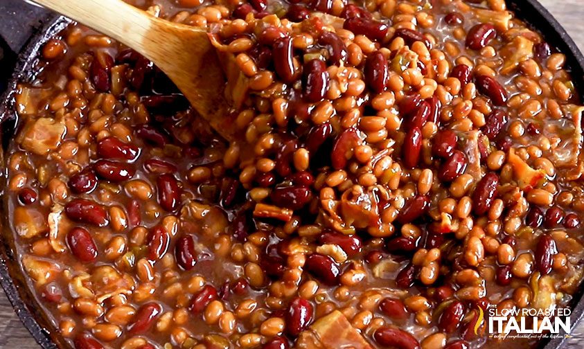 wooden spoon in baked beans