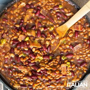 pot of smoked baked beans with serving spoon