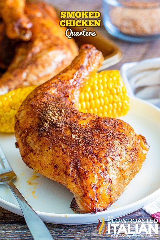 titled image (and shown): Smoked chicken quarters on a plate with corn on the cob