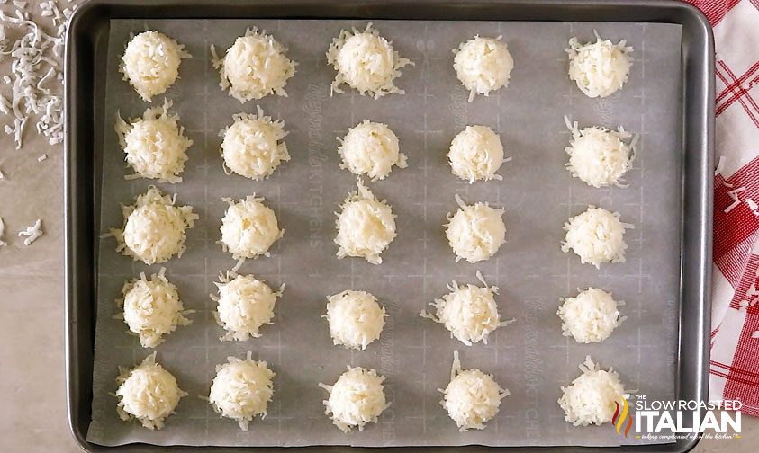 pre-baked coconut macaroons on baking sheet
