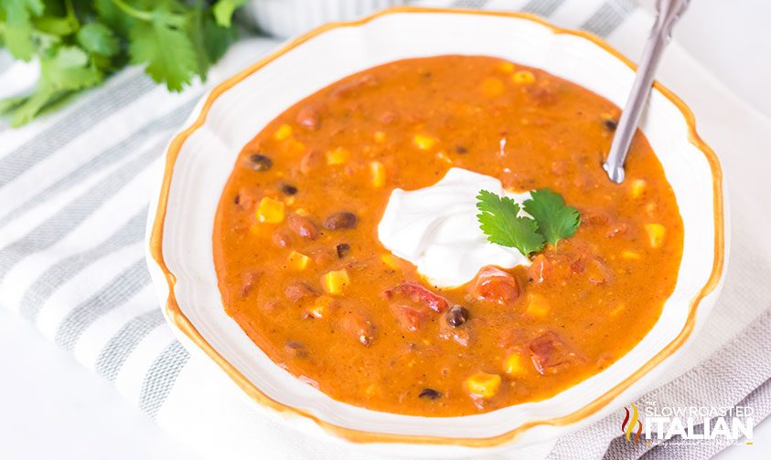 a bowl of chili soup on the table