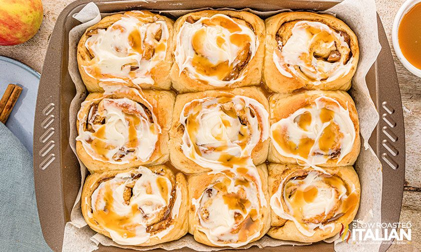 apple pie cinnamon rolls with glaze on top
