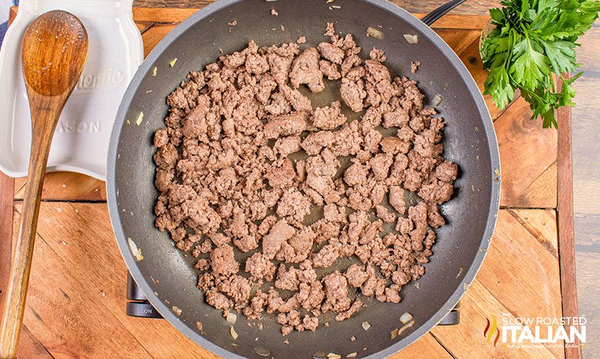 ground beef cooking in pan