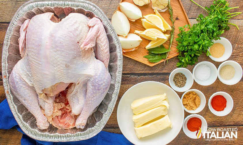 raw turkey with spices in small bowls