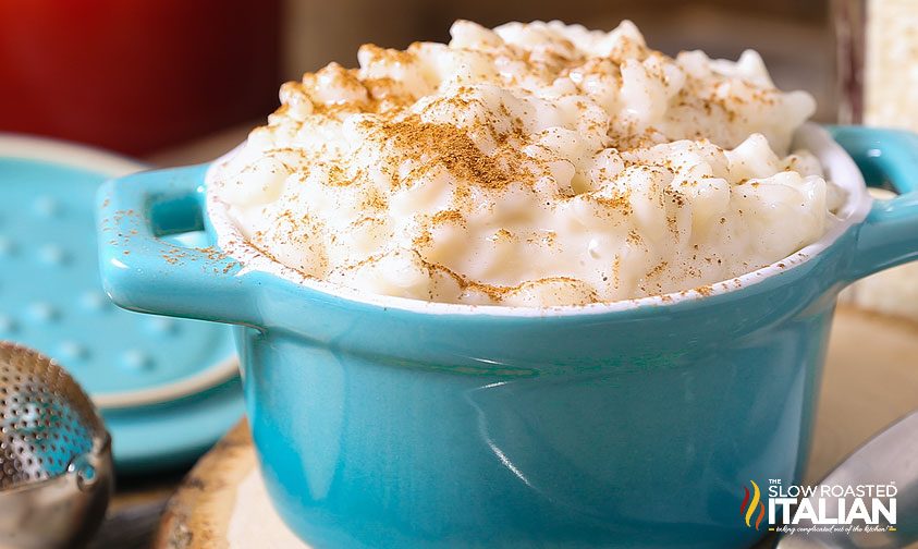 Creamy Vanilla Rice Pudding in a small blue crock