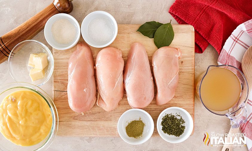ingredients on cutting board for chicken and dumplings crockpot recipe