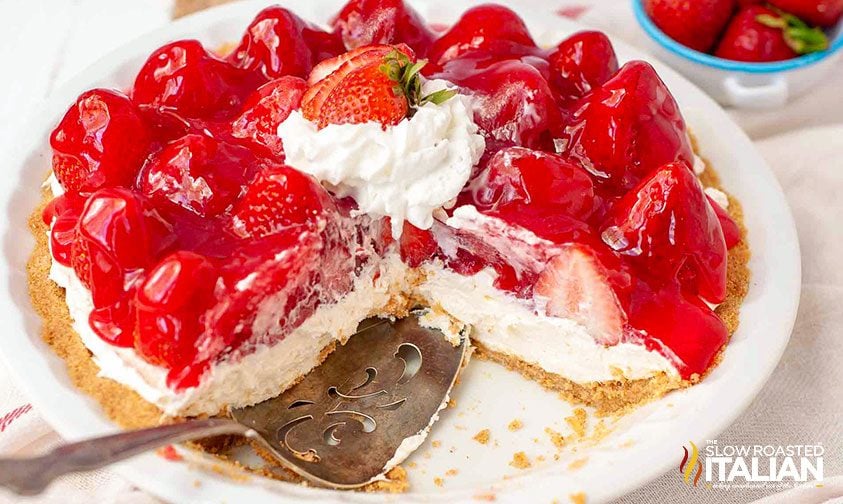 No-Bake Strawberry Cheesecake on a cake plate