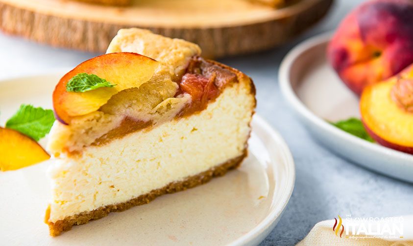 a slice of Peach Cobbler Cheesecake